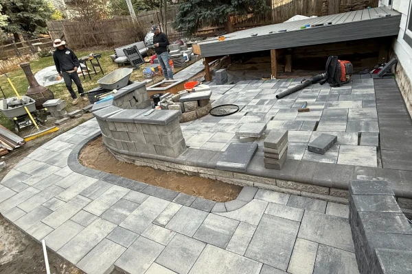 Professional hardscaping installation including patios, walkways, and retaining walls in Parker, CO